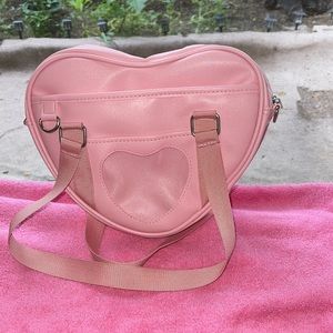 Pink heart shape purse